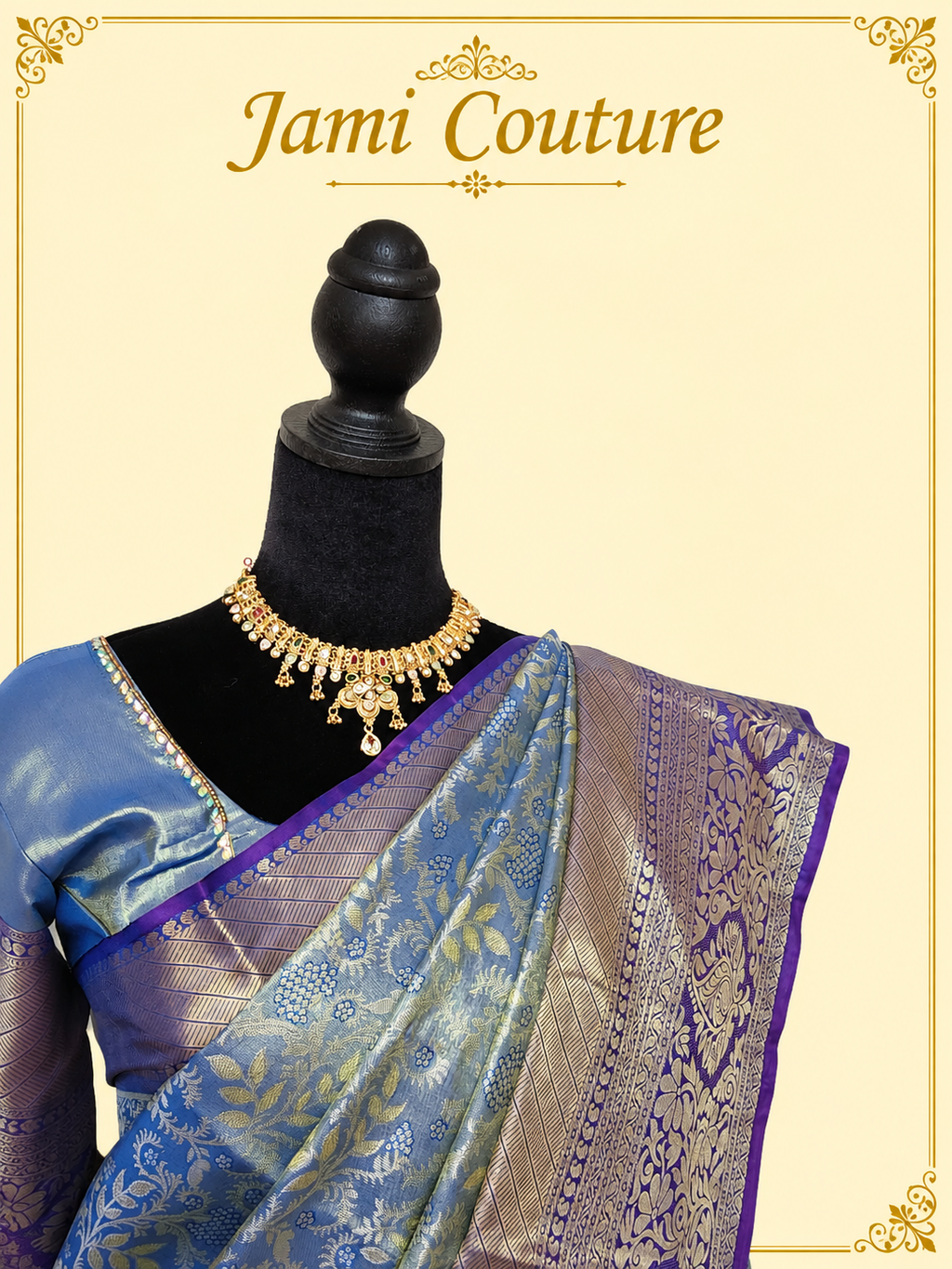 Close-up of the steel blue silk with gold floral zari weave, purple border and maggam work blouse