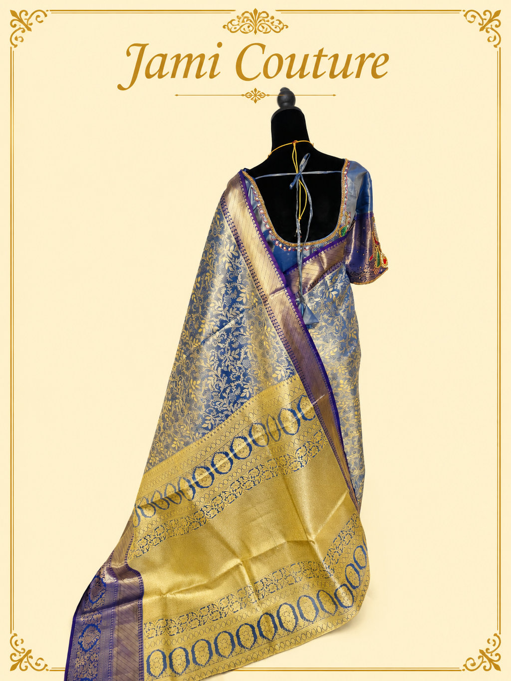 Back view showing the wide gold zari pallu of the steel blue Kanchivaram silk saree