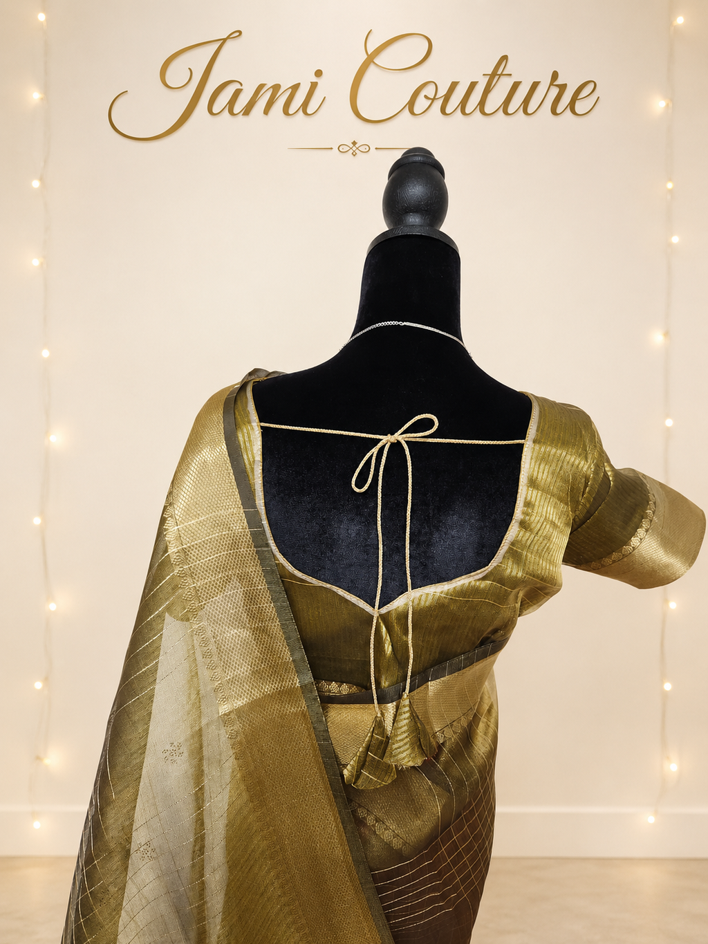 Close-up of the matching stitched blouse back with tie closure and the sheer organza pallu