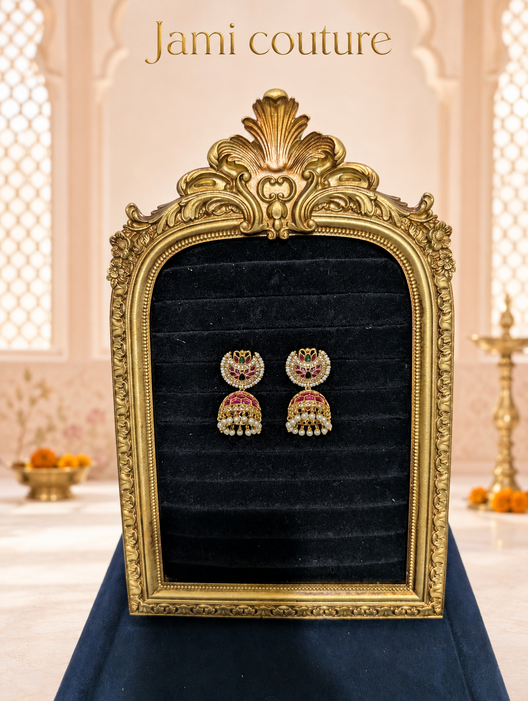 Ruby, emerald and white kundan jhumka earrings framed on black velvet