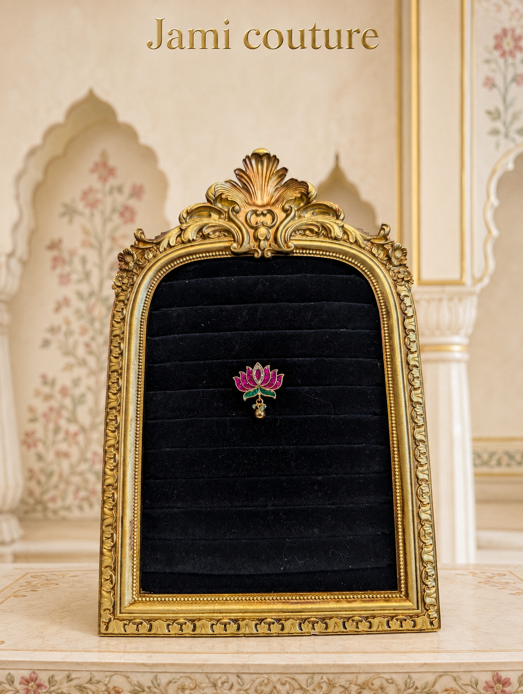 Ruby and emerald lotus jadau statement ring framed on black velvet