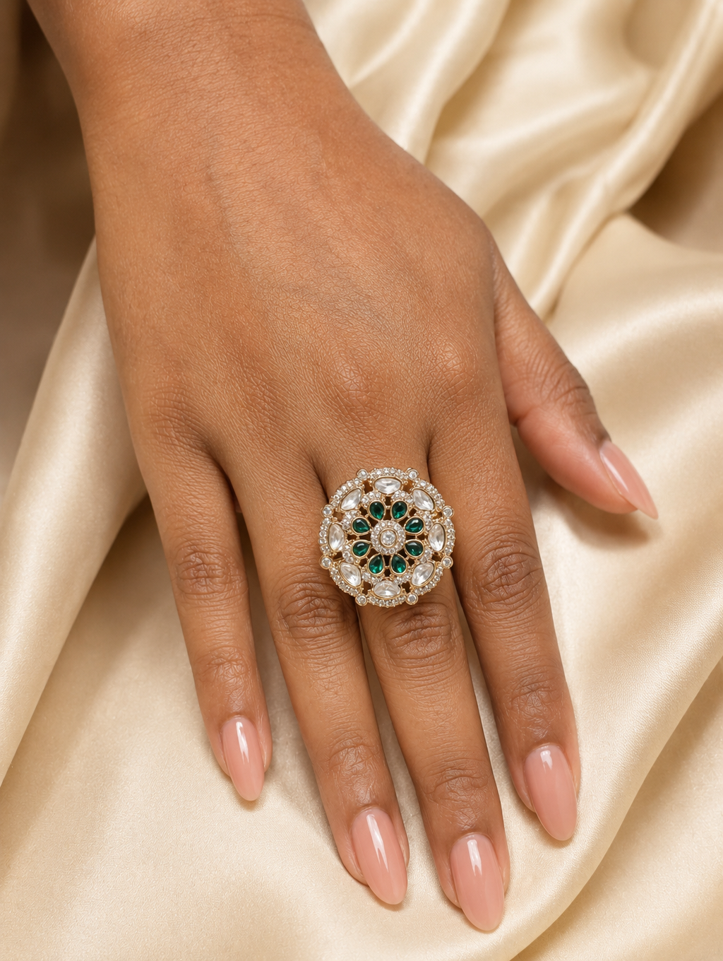 Model wearing the emerald green and white kundan floral statement ring