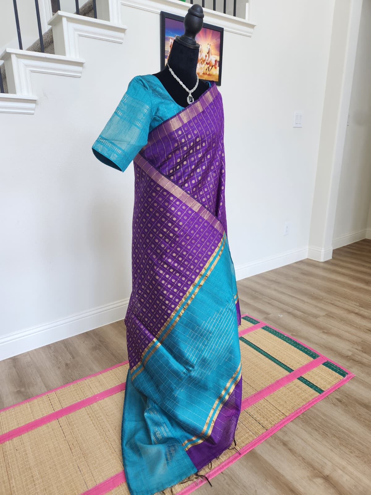 Natural-light three-quarter view of the purple 1000 butta silk cotton saree with teal blouse