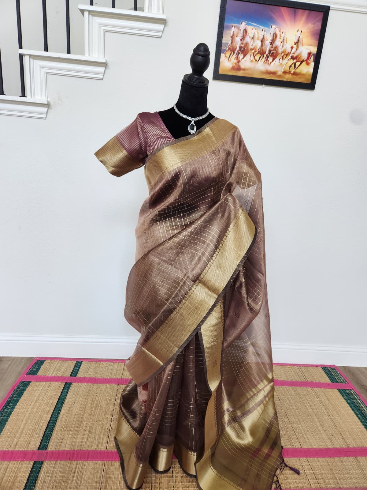Natural-light three-quarter view of the wine organza saree and matching blouse